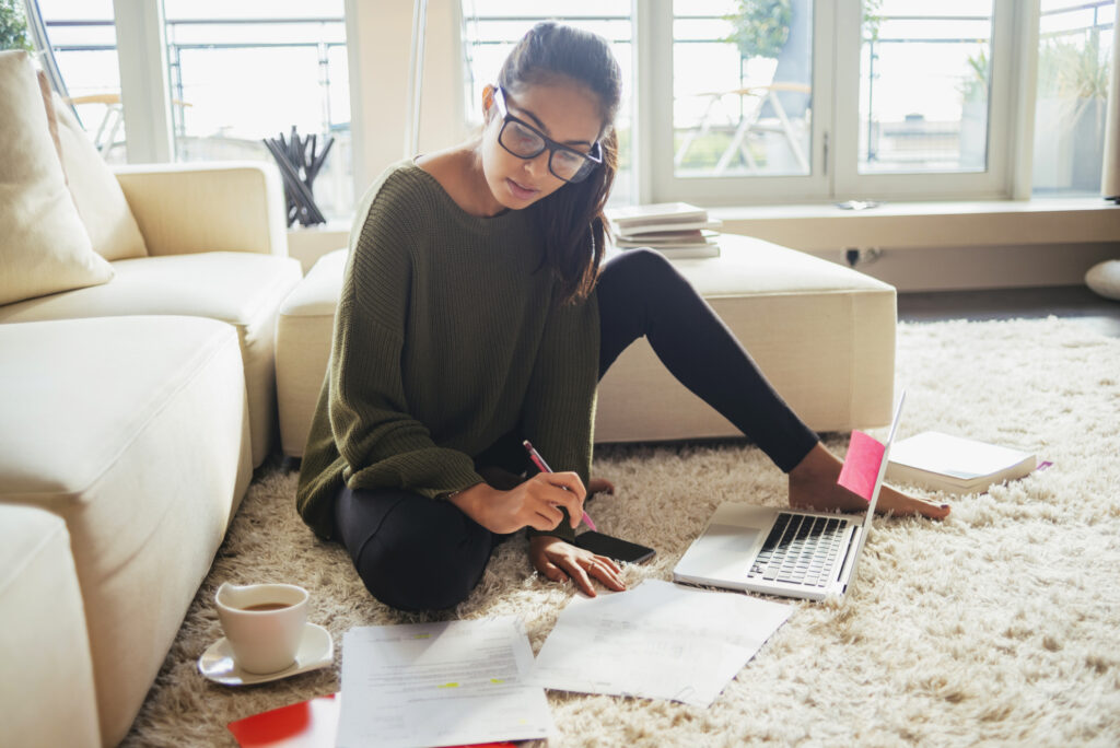 Person studying compound interest with helpful tips from Amerant Bank